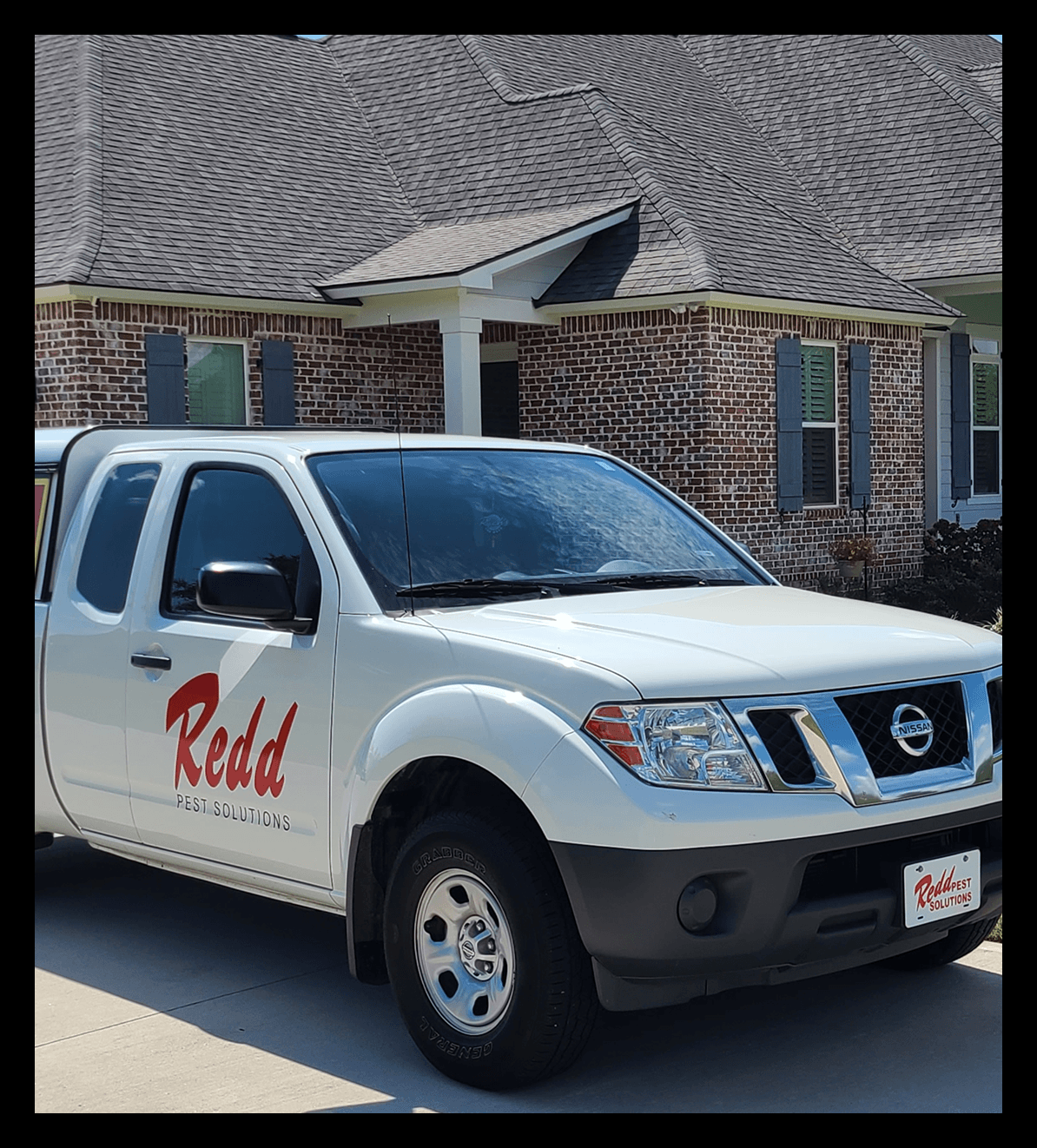 A white truck with the redd logo on the side