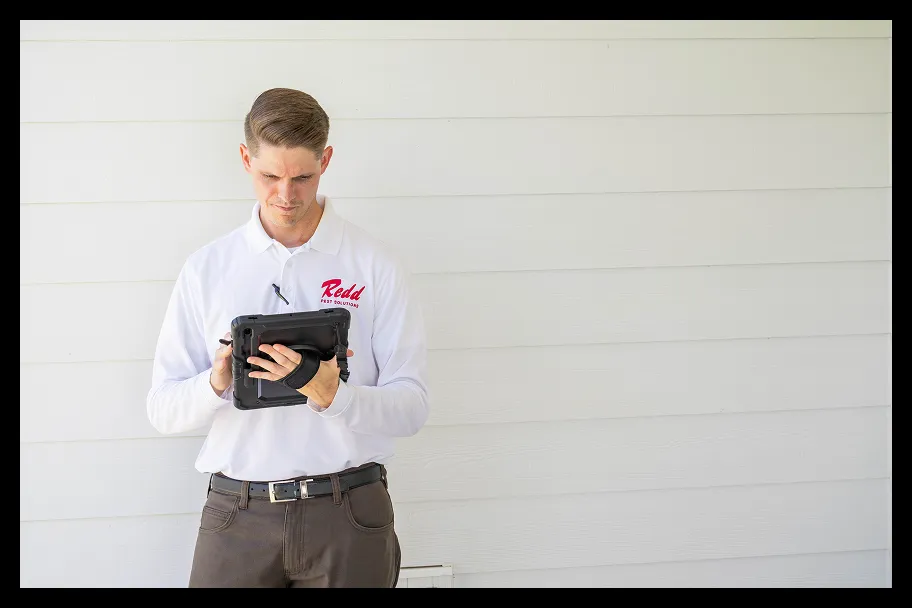 an employee on a tablet