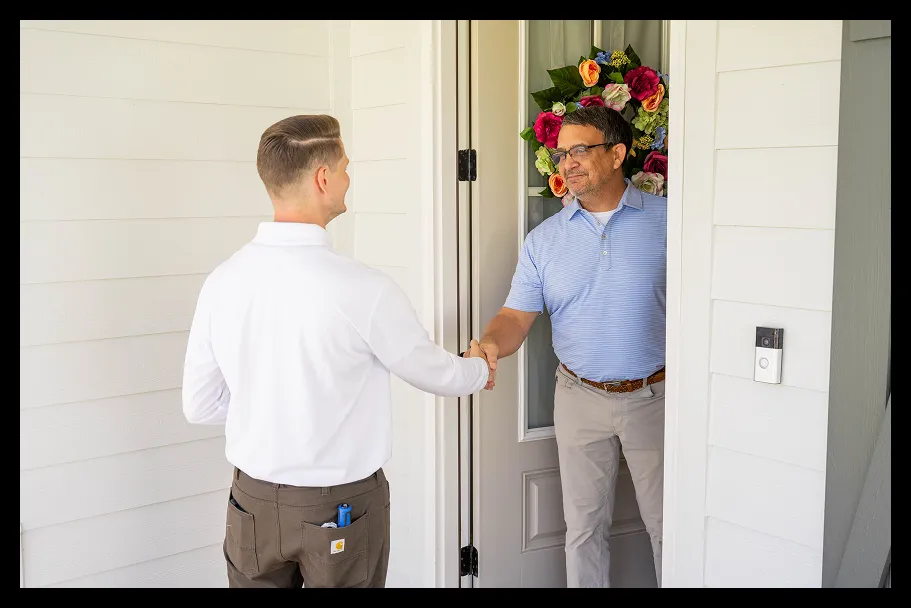 an employee greeting a home-owner
